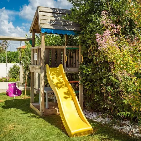 Andrija Family Dream With Heated Pool At The Sea With Beautiful Garden, Outside Cinema And Kids Playground