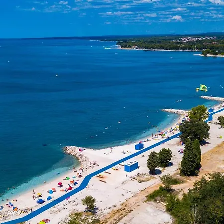 Andrija Family Dream With Heated Pool At The Sea With Beautiful Garden, Outside Cinema And Kids Playground Villa